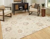 Bay Furniture Gallery - Ashley Furniture - Calkin Rug - 5' x 7' Rug / Linen/Gray/Caramel - R406392